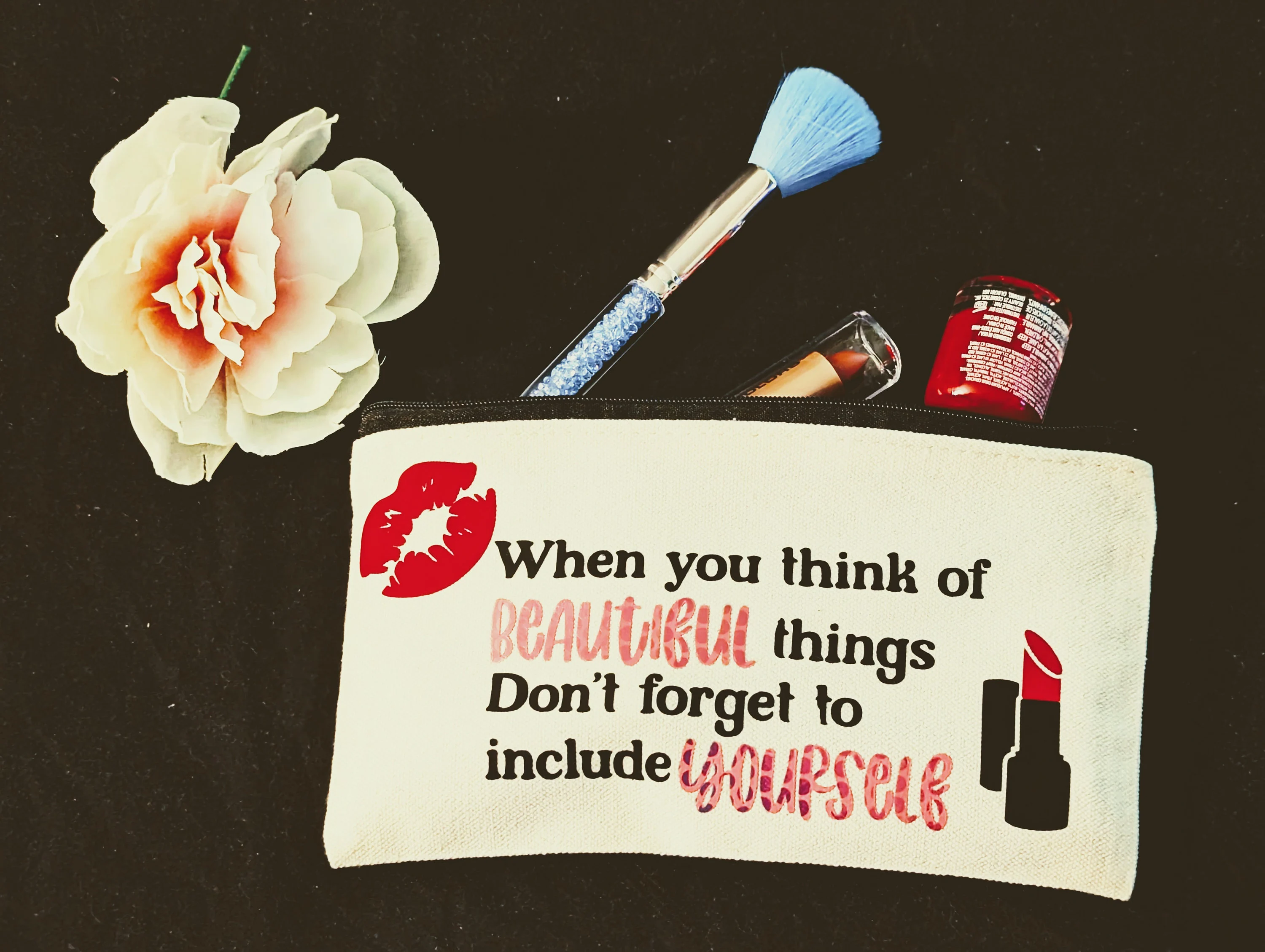 Cosmetic pouch with "When you think of beautiful things..." design